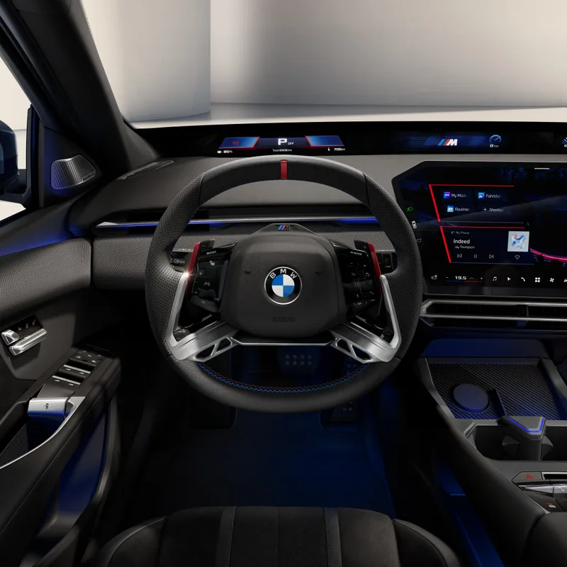 BMW i3 M60 xDrive · 프로토타입. M 스티어링 휠과 화면 구성. 최종 양산 사양과 다를 수 있습니다.